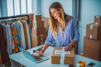 Woman shipping product from home